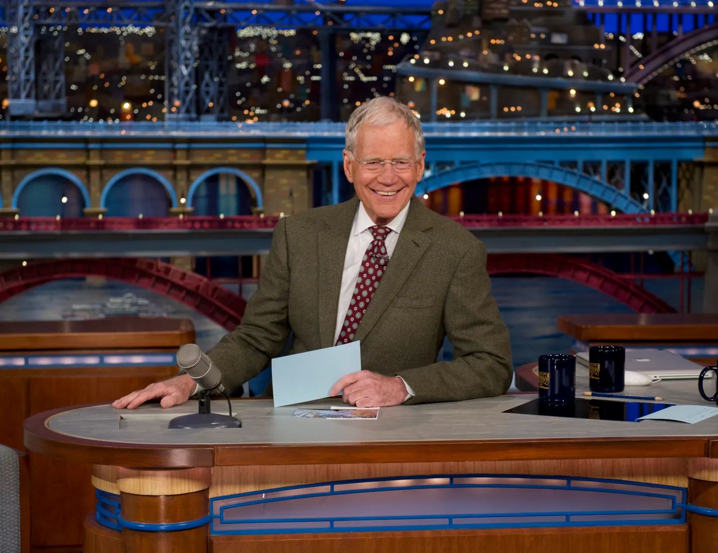 David Letterman behind a late-night desk