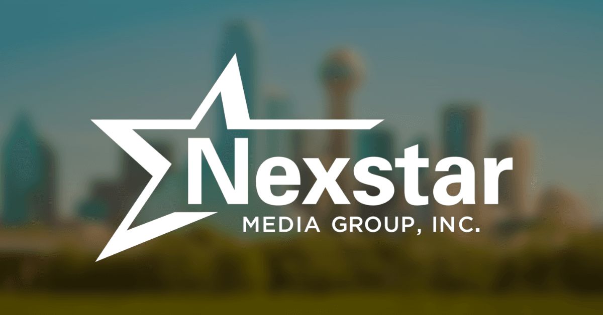 Nexstar Media Group logo over a blurred city skyline