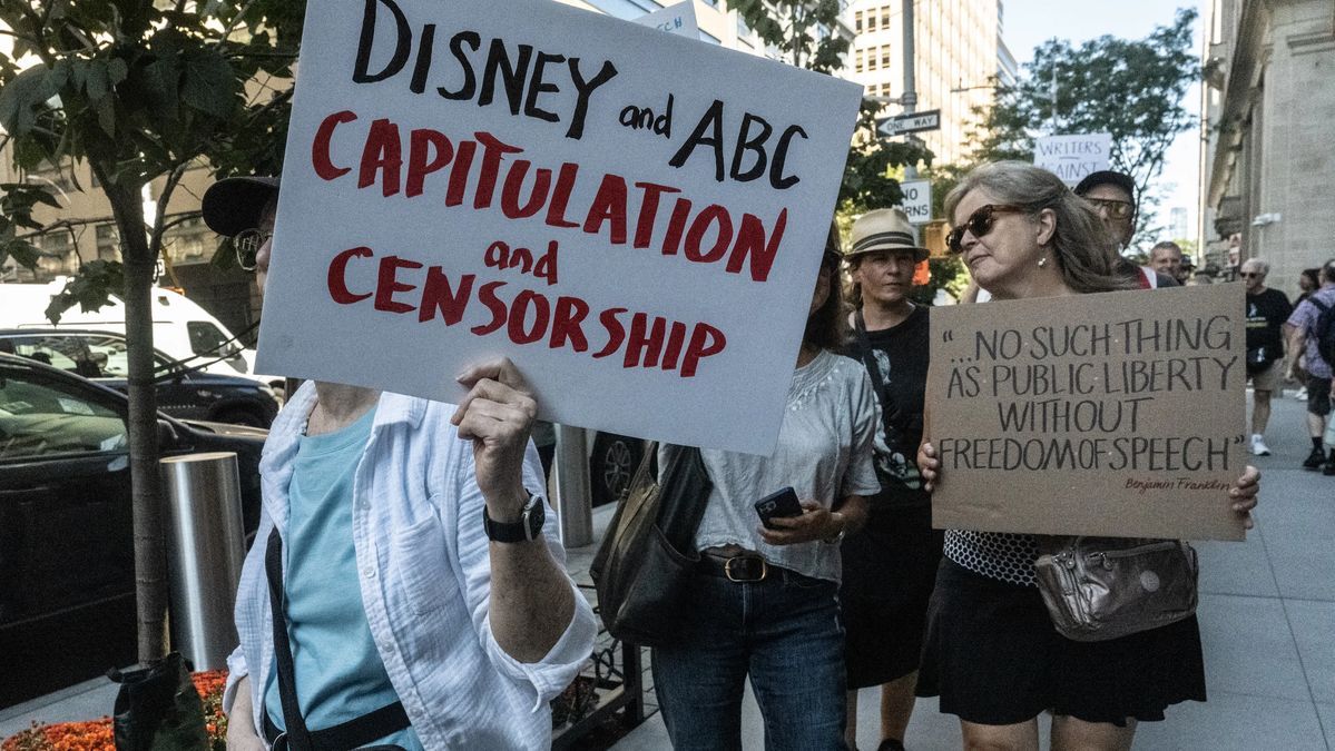 Protest signs about ABC and censorship